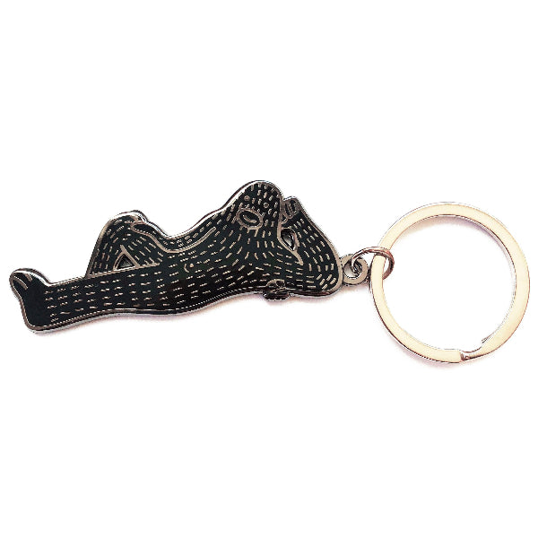 Hard enamel doublt sided keychain of a sasquatch named Frank Ape.