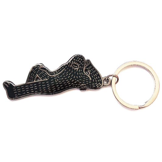 Hard enamel doublt sided keychain of a sasquatch named Frank Ape.