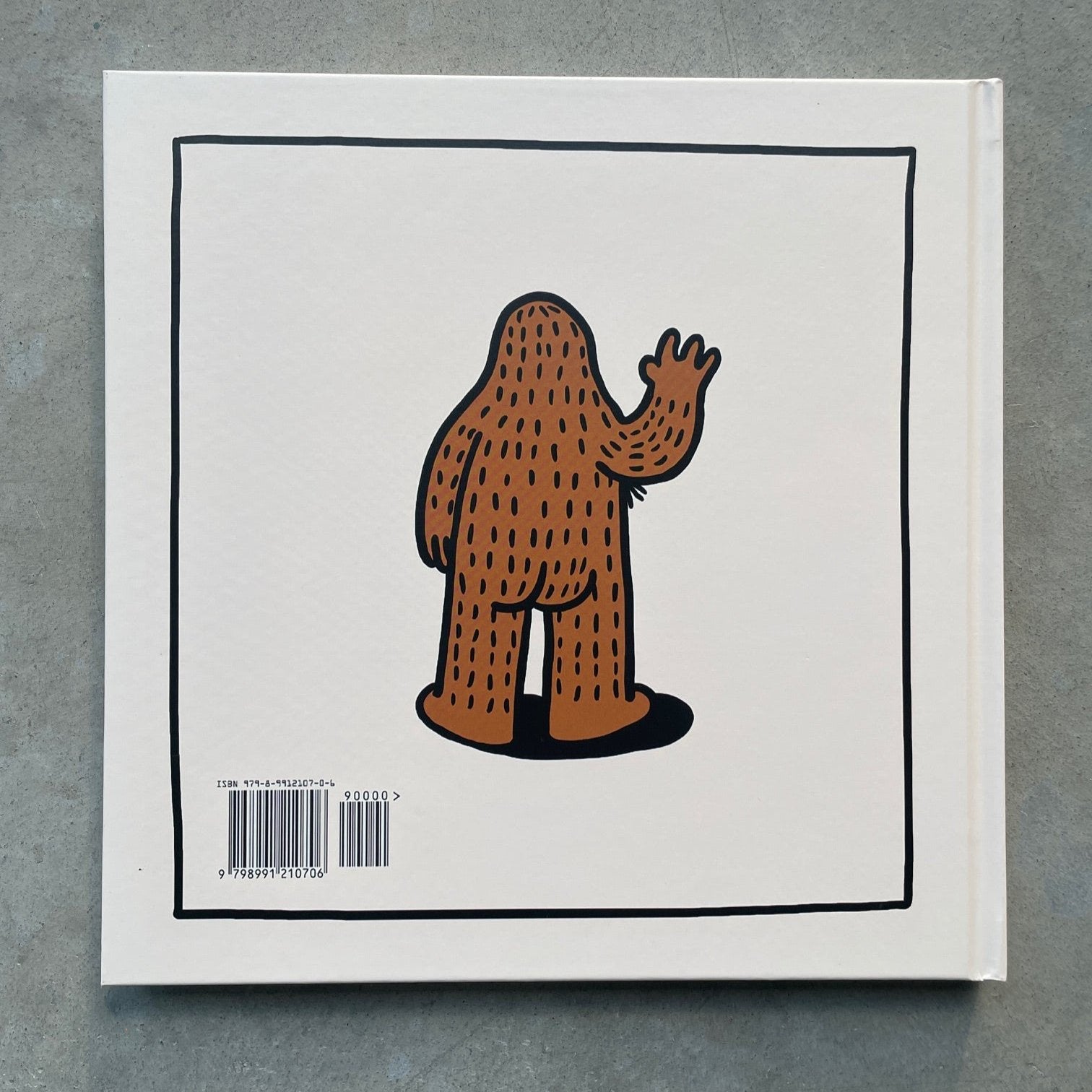 Hardcover book titled 'There's Magic Inside All of Us' with a colorful illustration of the back side of Frank Ape, a magical sasquatch on the back cover.