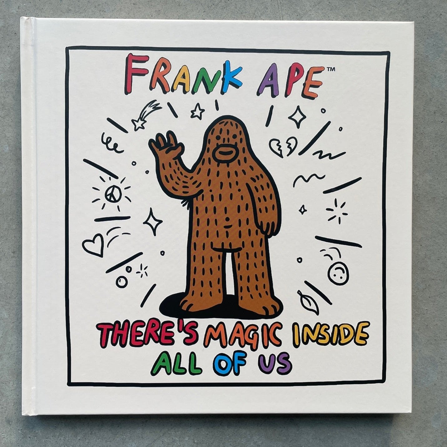 Hardcover book titled 'There's Magic Inside All of Us' with a colorful illustration of Frank Ape, a magical sasquatch on the cover.